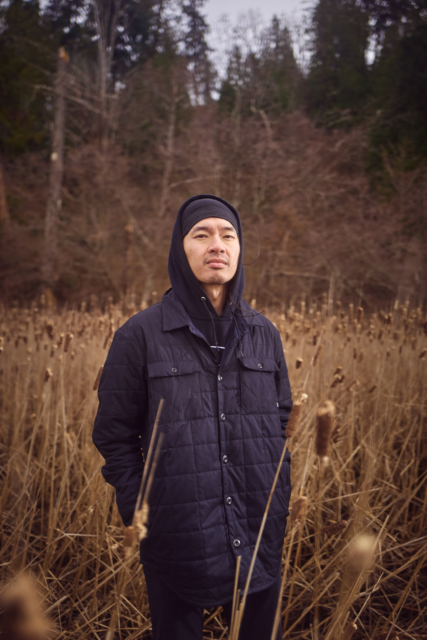 Portrait of Daniel Lew wearing a black hoodie.